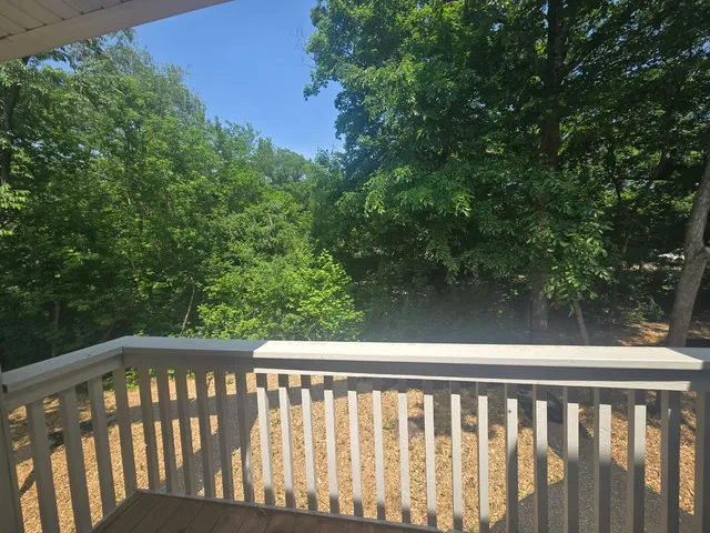 a view of a wooden fence