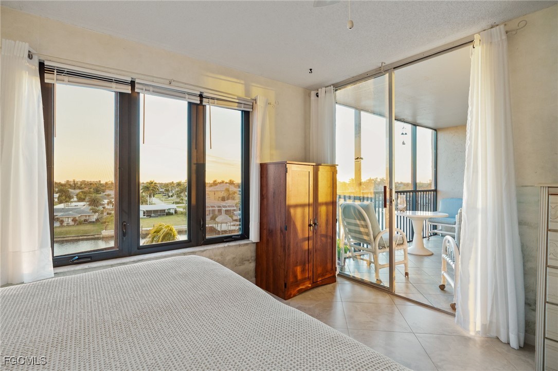 4260 Southeast 20th Place, Unit 502 Cape Coral, FL 33904 - Photo 19 of 49 a view of an empty room and window