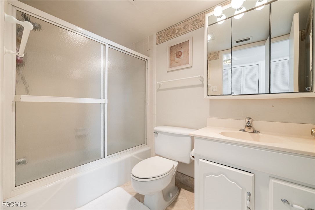 4260 Southeast 20th Place, Unit 502 Cape Coral, FL 33904 - Photo 23 of 49 a bathroom with a sink toilet and shower