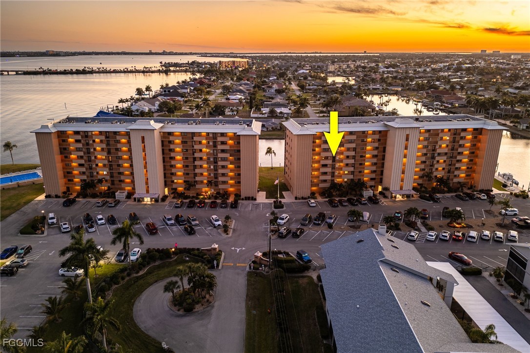 4260 Southeast 20th Place, Unit 502 Cape Coral, FL 33904 - Photo 35 of 49 a view of a city and ocean view