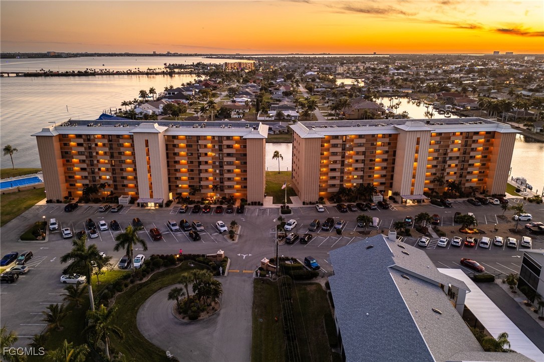 4260 Southeast 20th Place, Unit 502 Cape Coral, FL 33904 - Photo 36 of 49 a view of a city and ocean view