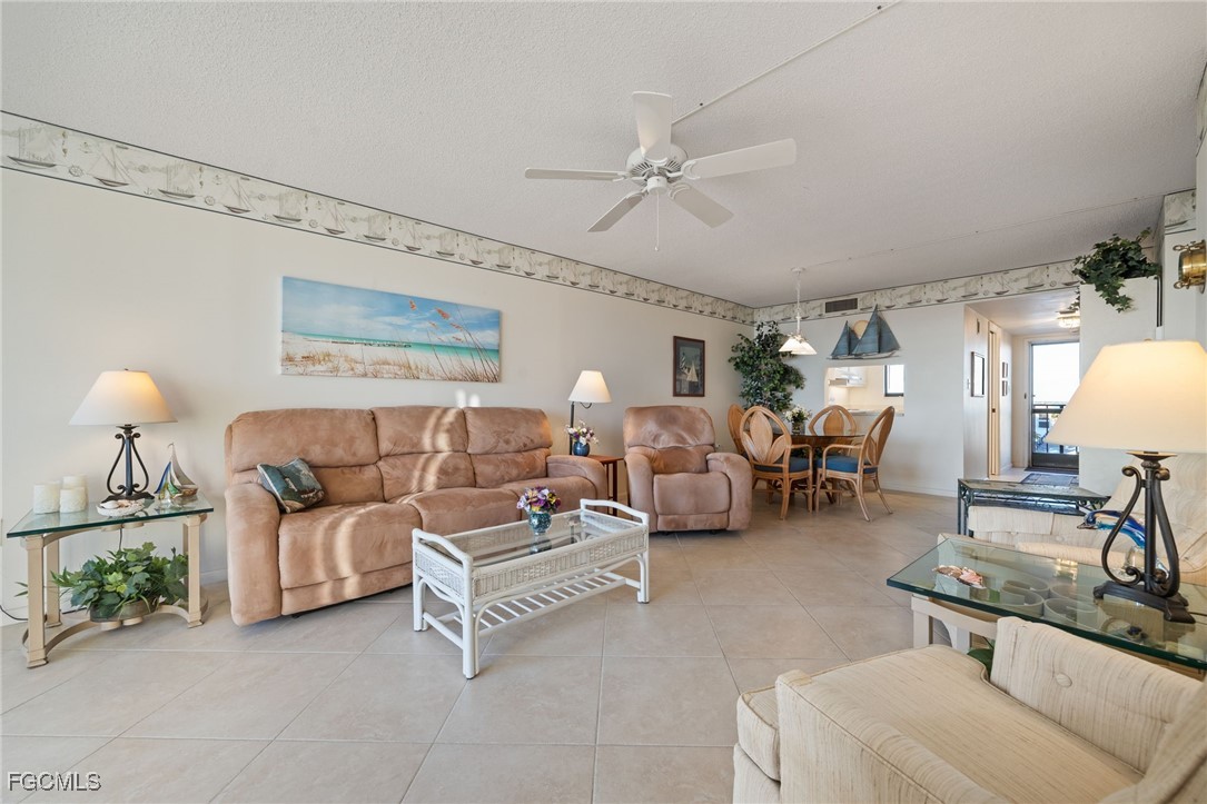 4260 Southeast 20th Place, Unit 502 Cape Coral, FL 33904 - Photo 7 of 49 a living room with furniture
