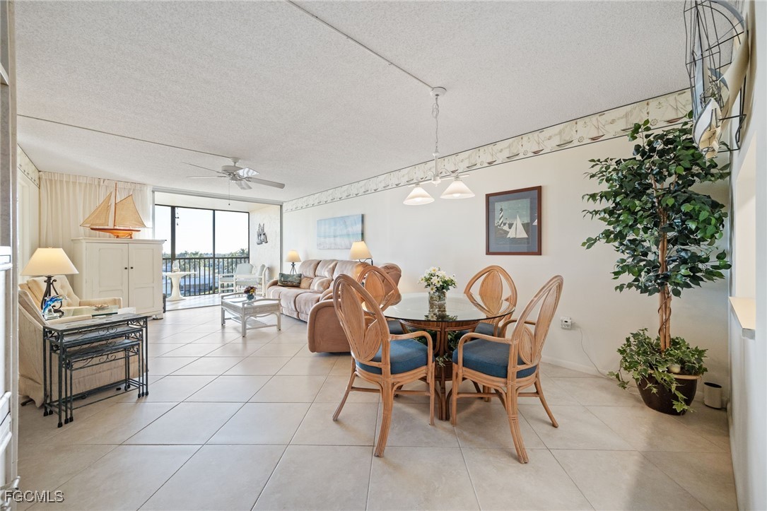 4260 Southeast 20th Place, Unit 502 Cape Coral, FL 33904 - Photo 8 of 49 a view of a dining room with furniture