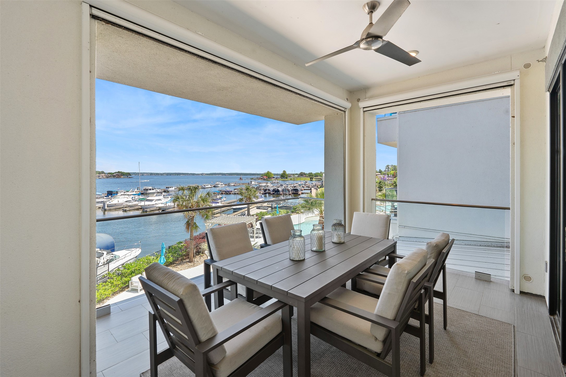 199 Waterpoint Court, Unit 208 Conroe, TX 77304 - Photo 2 of 39 a view of a dining room with furniture window and outside view