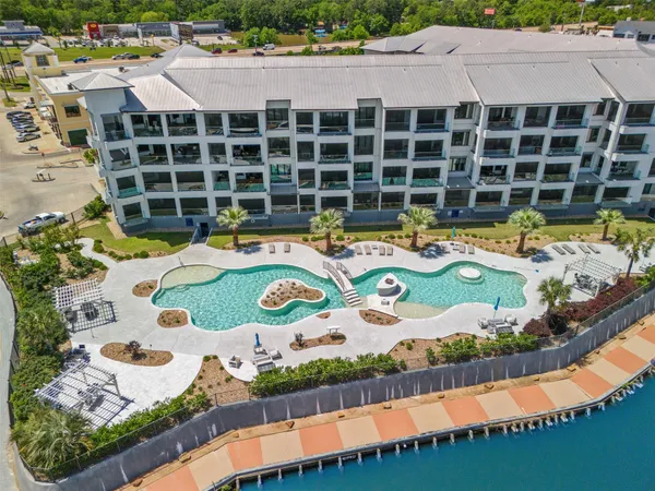 $595,000 | 199 Waterpoint Court, Unit 208, Conroe, TX 77304