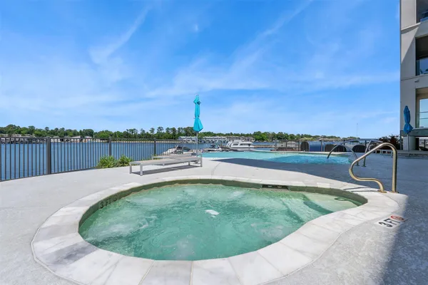$595,000 | 199 Waterpoint Court, Unit 208, Conroe, TX 77304