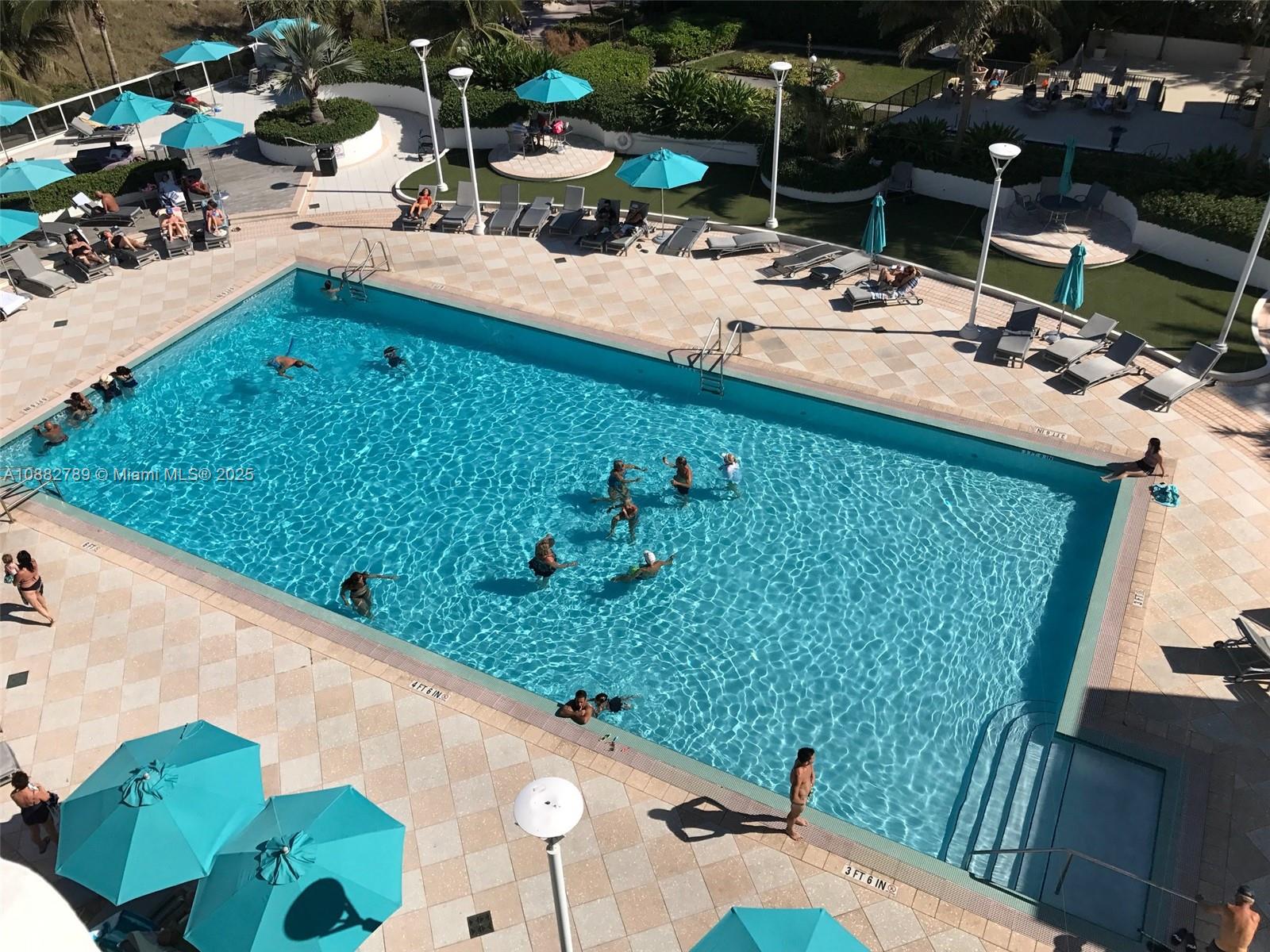 100 Lincoln Road, Unit 644 Miami Beach, FL 33139 - Photo 6 of 46 a view of swimming pool from a balcony
