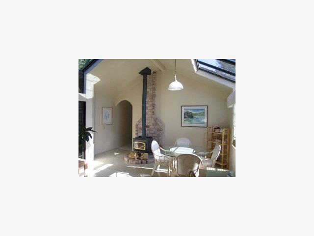 Se Cor Torres & Ocean Carmel, CA 93921 - Photo 3 of 5 a view of a living room with a table and chairs