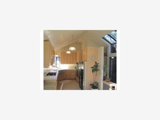 Se Cor Torres & Ocean Carmel, CA 93921 - Photo 4 of 5 a en suite bathroom with a sink and mirror