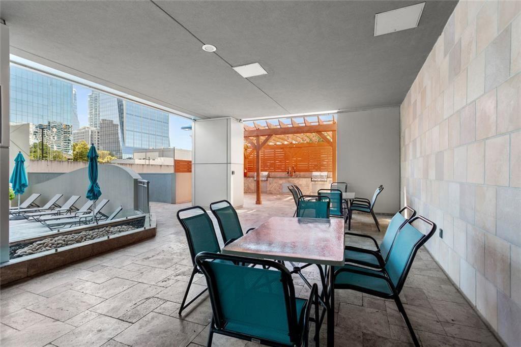 3338 Peachtree Road Northeast, Unit 3501 Atlanta, GA 30326 - Photo 39 of 46 a view of a dining room with furniture window and outside view