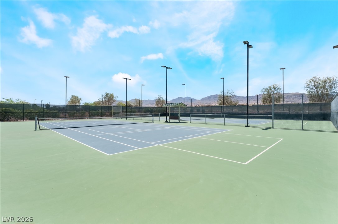 6432 Spring Jog Street Las Vegas, NV 89166 - Photo 46 of 61 Serve up some fun on these meticulously maintained community tennis courts.