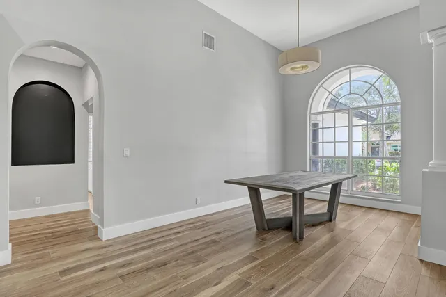 a view of a livingroom with furniture and wooden floor