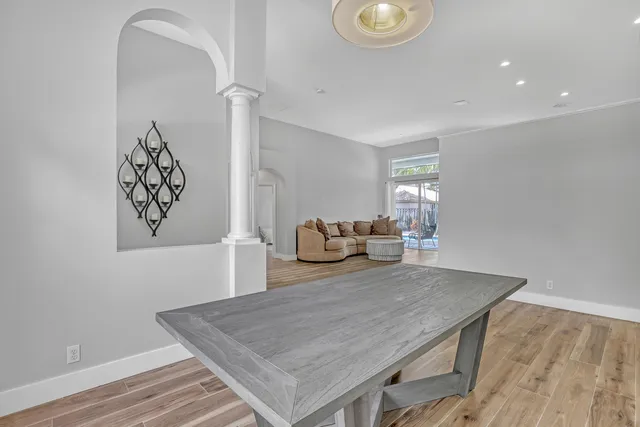 a room with a table and chairs