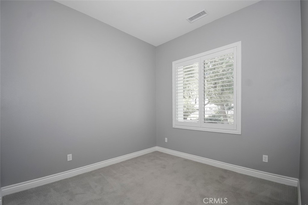 148 Spectacle Irvine, CA 92618 - Photo 15 of 47 an empty room with a window