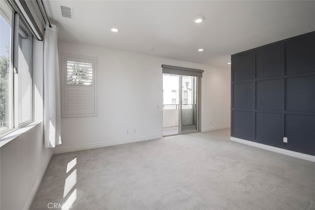 148 Spectacle Irvine, CA 92618 - Photo 21 of 47 a view of an empty room with a window