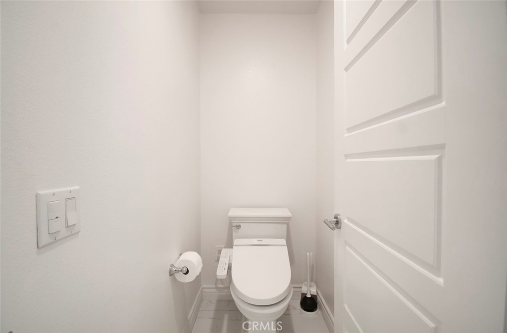 148 Spectacle Irvine, CA 92618 - Photo 25 of 47 a bathroom with a toilet