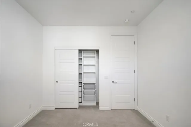 an empty room with closet