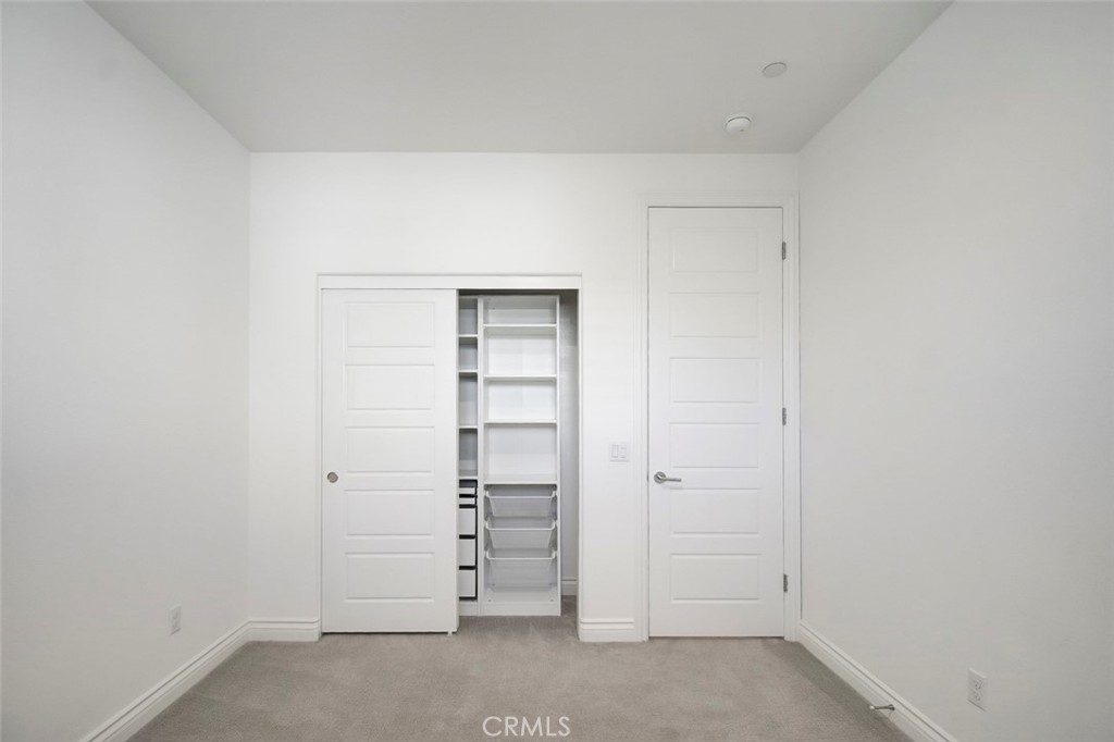 148 Spectacle Irvine, CA 92618 - Photo 27 of 47 an empty room with closet