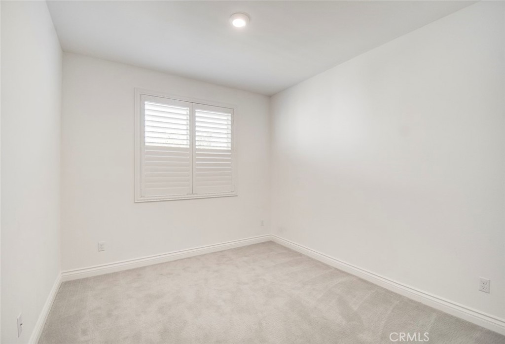 148 Spectacle Irvine, CA 92618 - Photo 28 of 47 an empty room with a window