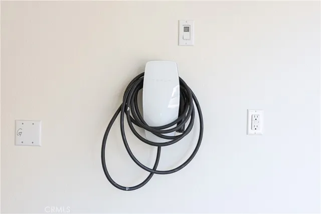 a view of a hallway with stairs