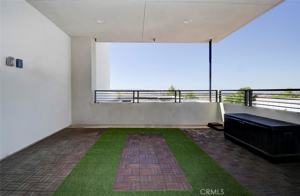 148 Spectacle Irvine, CA 92618 - Photo 40 of 47 a view of a yard with wooden floor