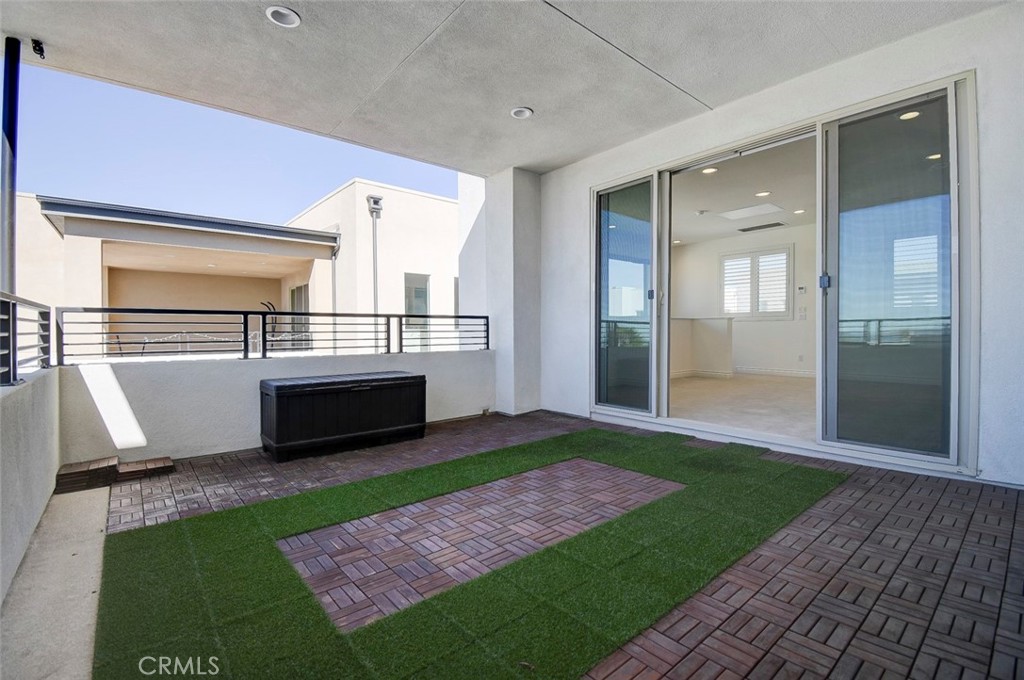 148 Spectacle Irvine, CA 92618 - Photo 42 of 47 a view of a porch with a yard