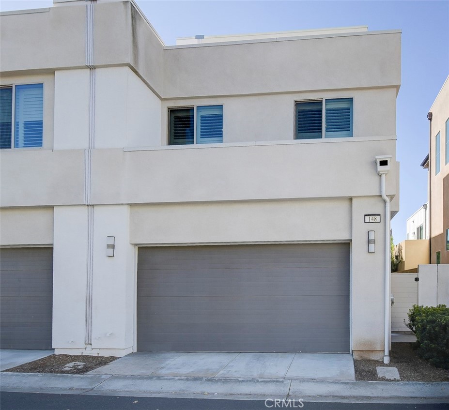148 Spectacle Irvine, CA 92618 - Photo 45 of 47 a view of a house with garage