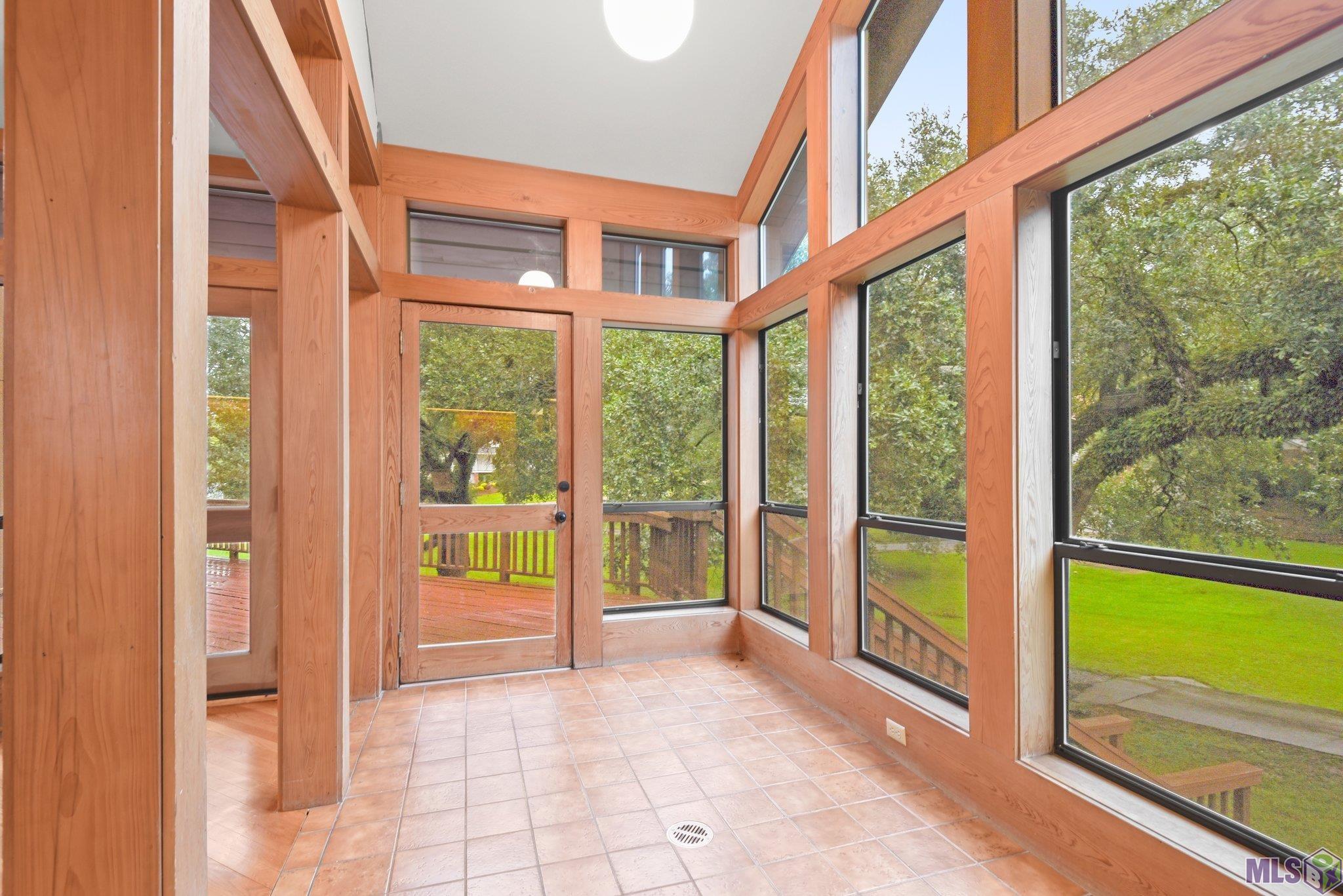 535 Jean Lafitte Avenue Baton Rouge, LA 70810 - Photo 17 of 39 Sunroom