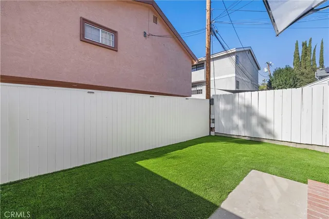 a view of a backyard with a garden