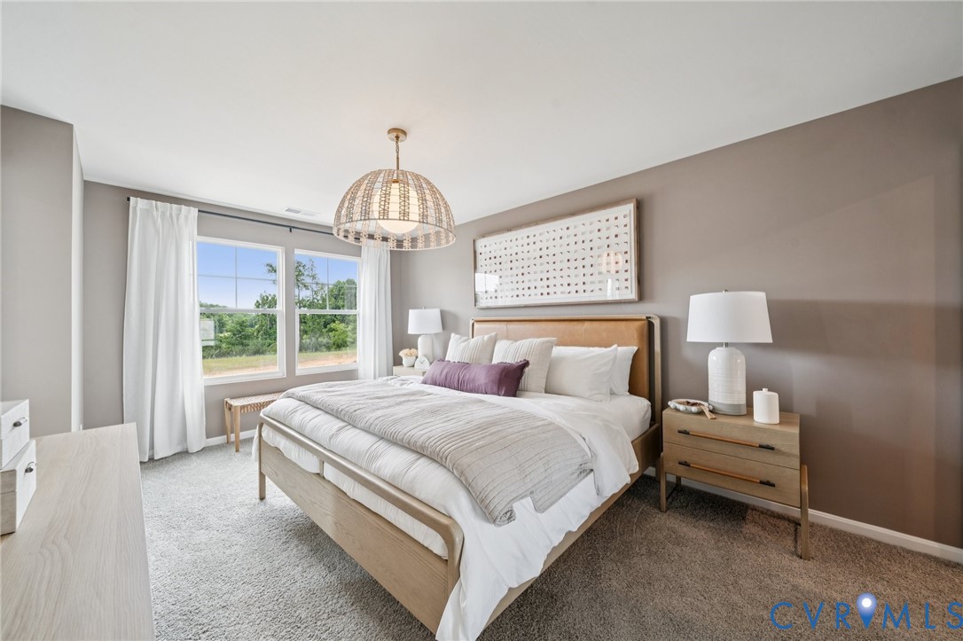 3517 Perrins Hill Way Prince George, VA 23875 - Photo 22 of 31 a bedroom with bed and window