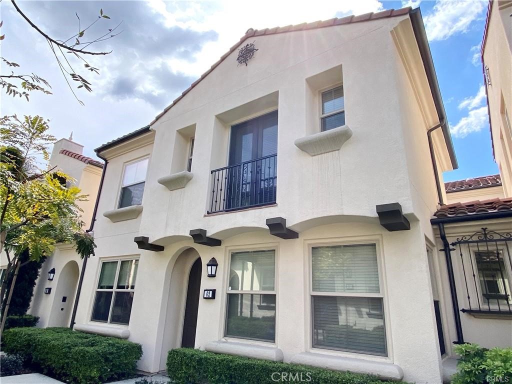 a front view of a building with a lot of windows