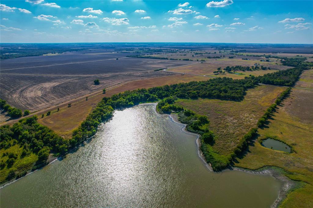Unk Round Hall Road Holland, TX 76534 - Photo 20 of 27 a view of a street with an ocean