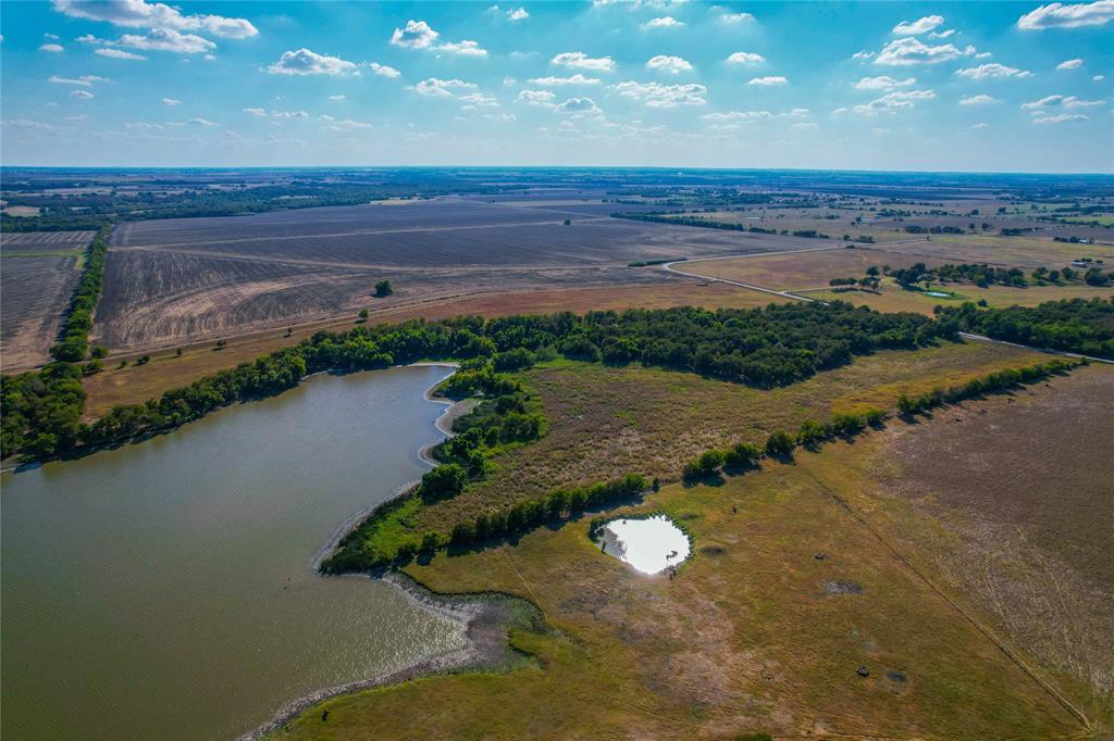 Unk Round Hall Road Holland, TX 76534 - Photo 21 of 27 a view of a lake with a city