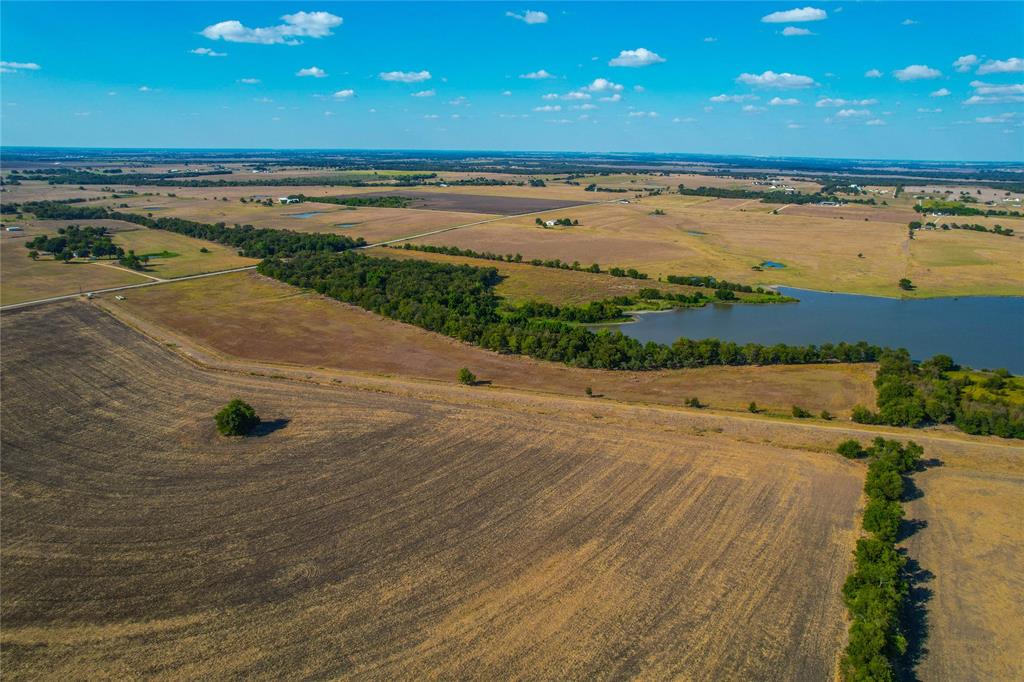 Unk Round Hall Road Holland, TX 76534 - Photo 10 of 27 a view of a swimming pool and an ocean view