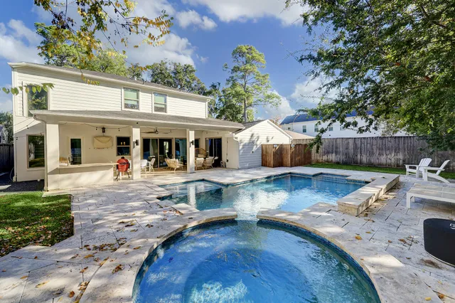 a view of a house with a swimming pool