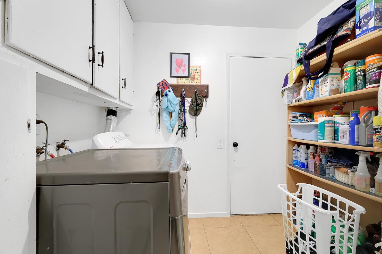 3132 4th Street Biggs, CA 95917 - Photo 19 of 21 a utility room with dryer and washer