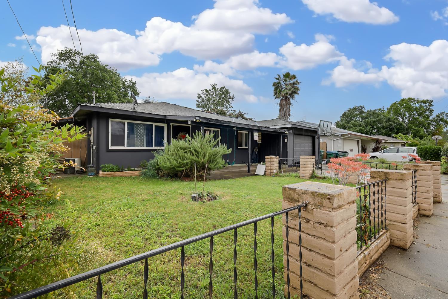 3132 4th Street Biggs, CA 95917 - Photo 3 of 21 a view of a house with a yard