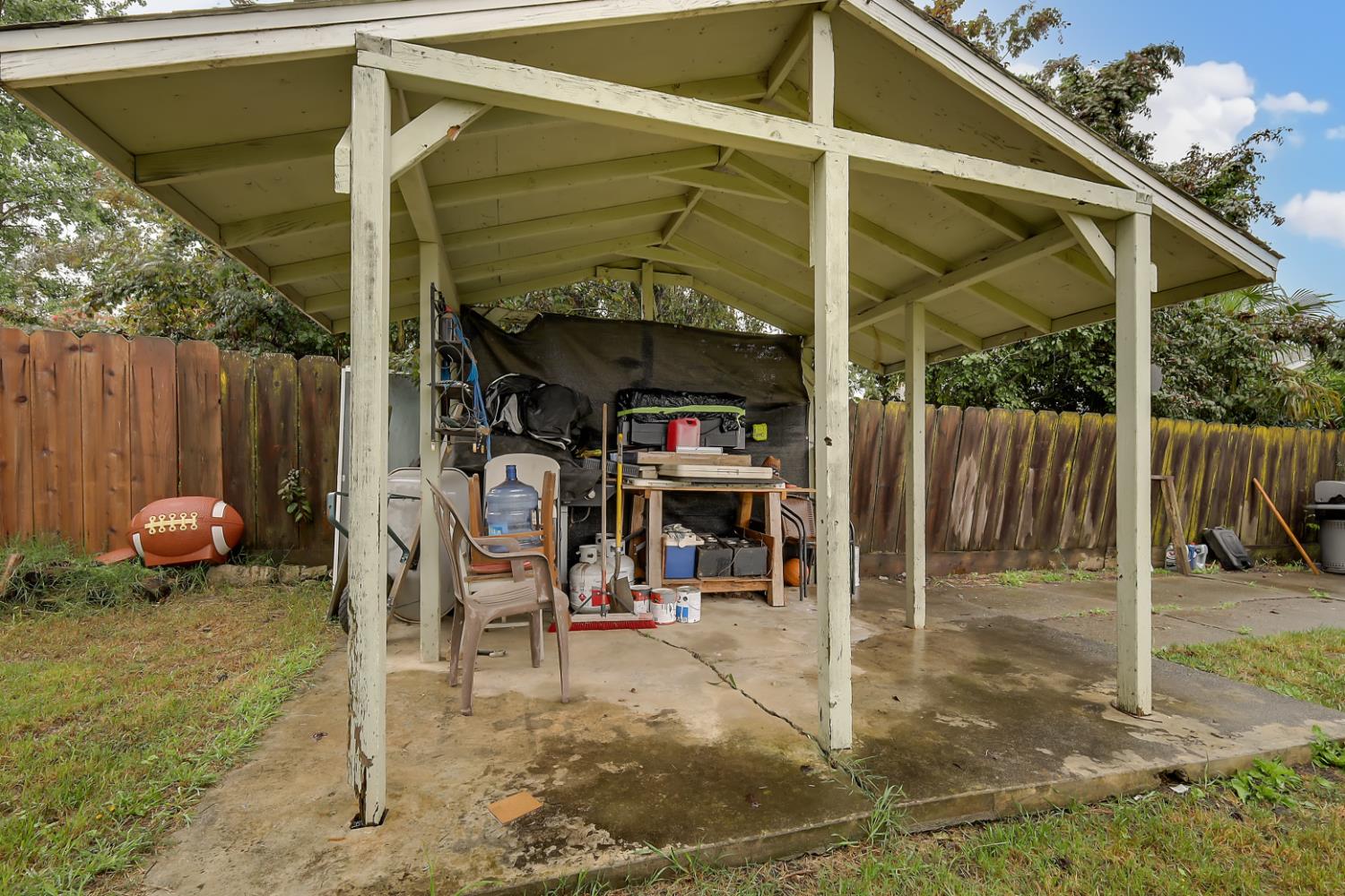 3132 4th Street Biggs, CA 95917 - Photo 8 of 21 a view of a chairs and table in the patio