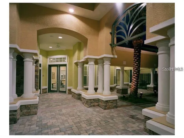 a view of a lobby with black carpet