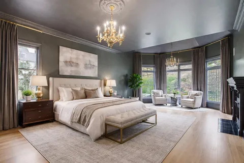 a view of an empty room with a fireplace