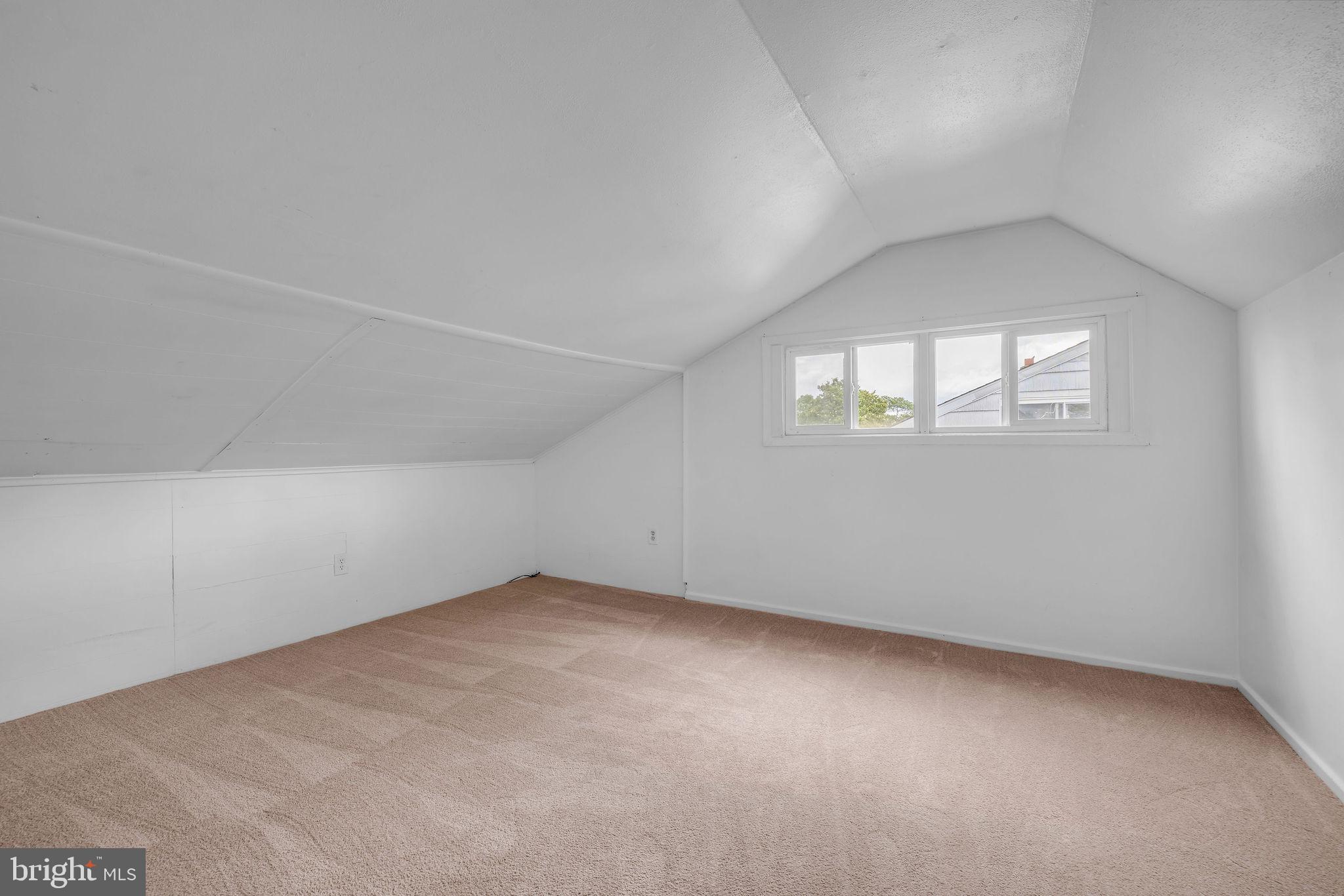 136 Brookside Boulevard Newark, DE 19713 - Photo 11 of 31 an empty room with a windows and ceiling fan