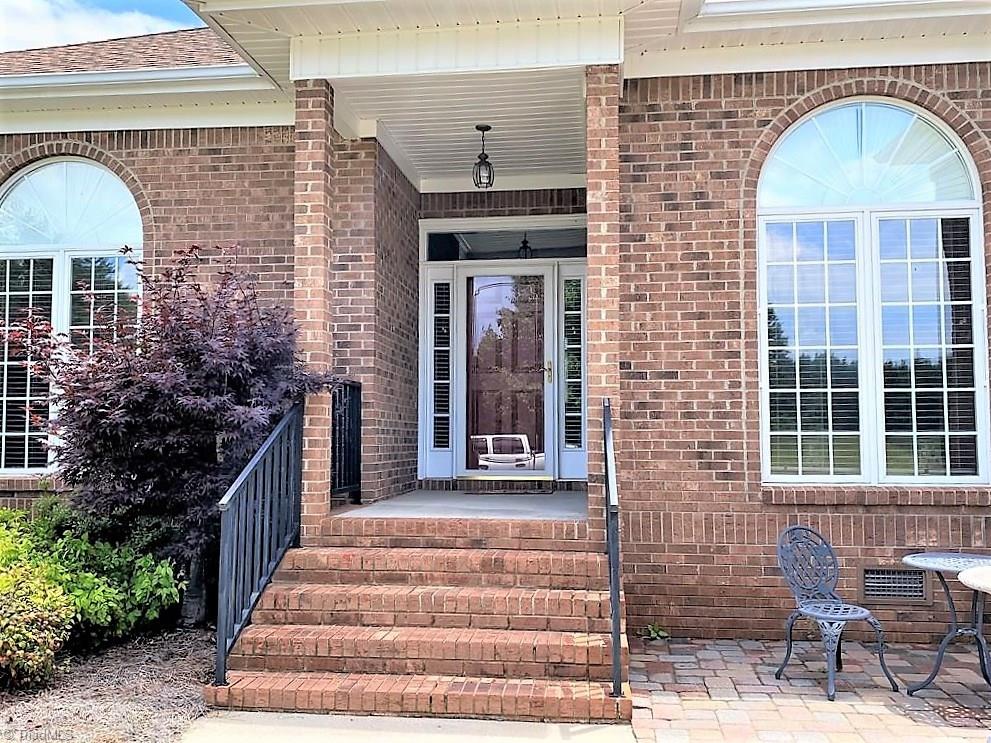 121 Belewsfield Road Stokesdale, NC 27357 - Photo 23 of 30 Front Porch and Patio