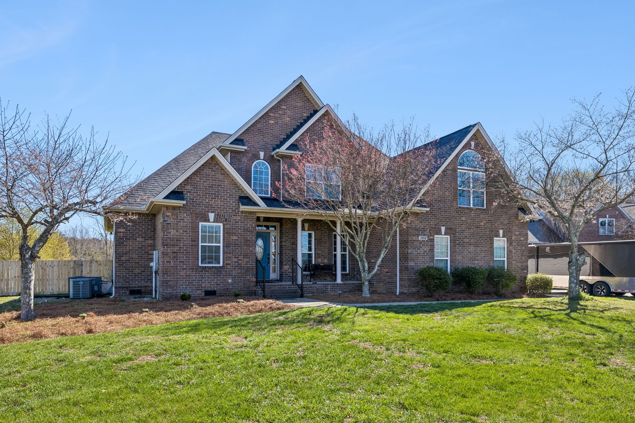 3918 Rowland Road Murfreesboro, TN 37128 - Photo 2 of 50 a front view of a house with a yard and garage