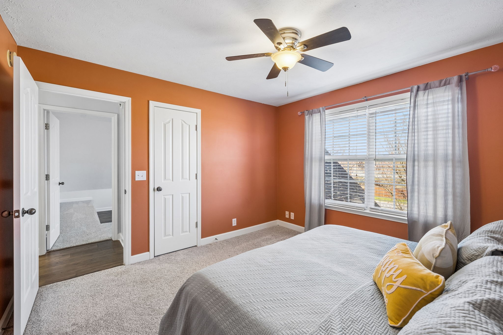 3918 Rowland Road Murfreesboro, TN 37128 - Photo 27 of 50 a bedroom with a large bed and a chandelier