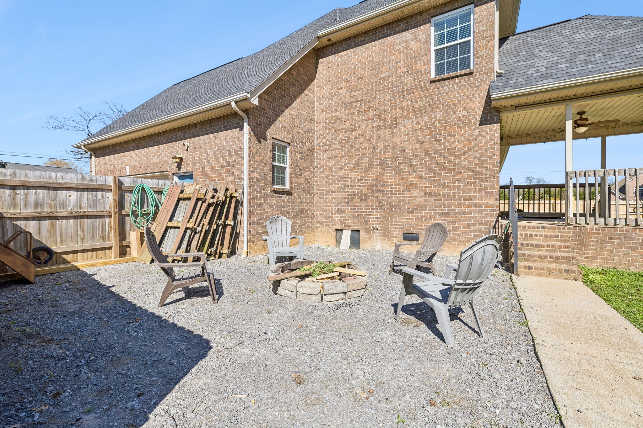 3918 Rowland Road Murfreesboro, TN 37128 - Photo 38 of 50 a view of a patio with a dining table and chairs