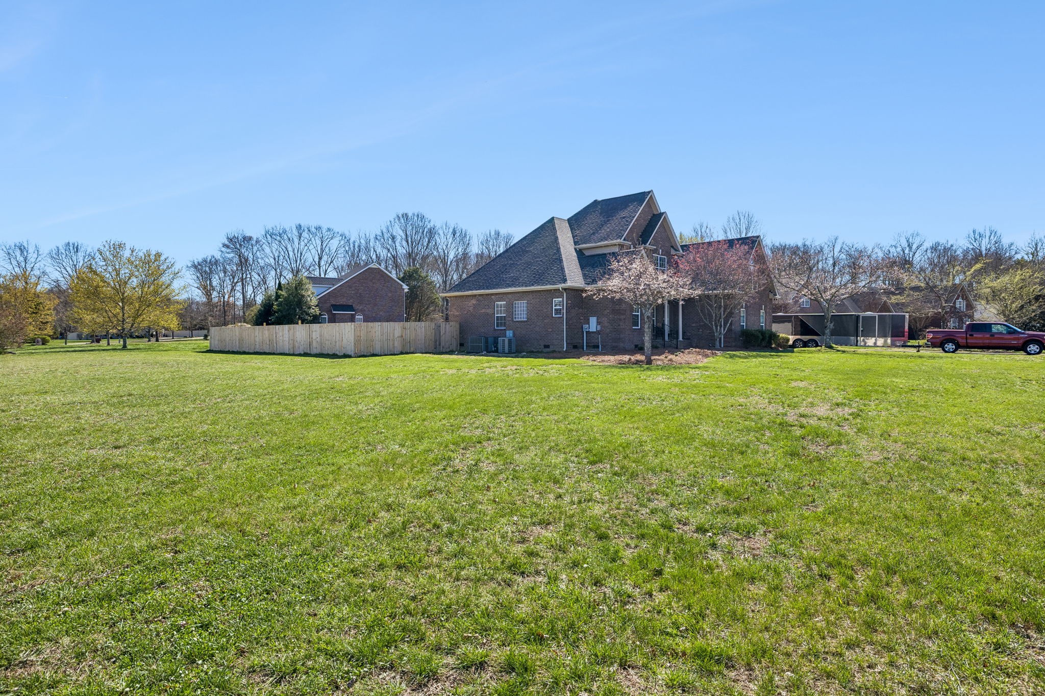 3918 Rowland Road Murfreesboro, TN 37128 - Photo 44 of 50 a view of a house with a yard and a large tree