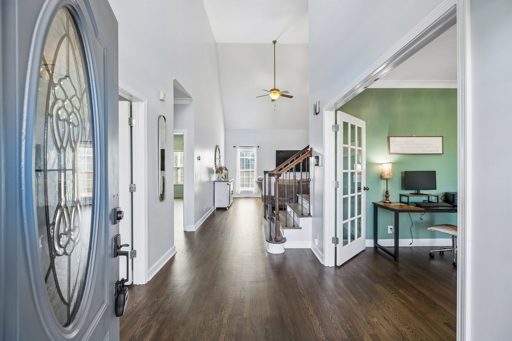 3918 Rowland Road Murfreesboro, TN 37128 - Photo 5 of 50 a view of a hallway with wooden floor windows and a livingroom