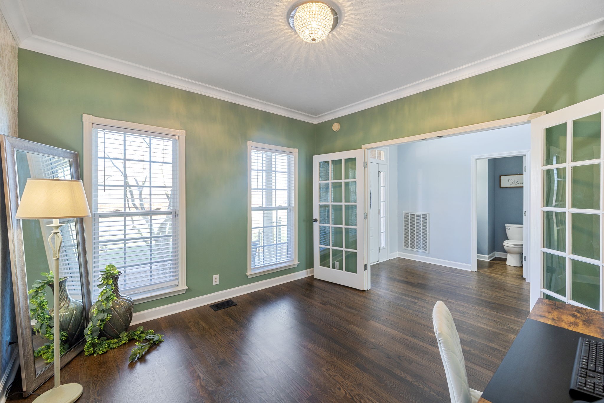 3918 Rowland Road Murfreesboro, TN 37128 - Photo 7 of 50 a view of an entryway with wooden floor and windows