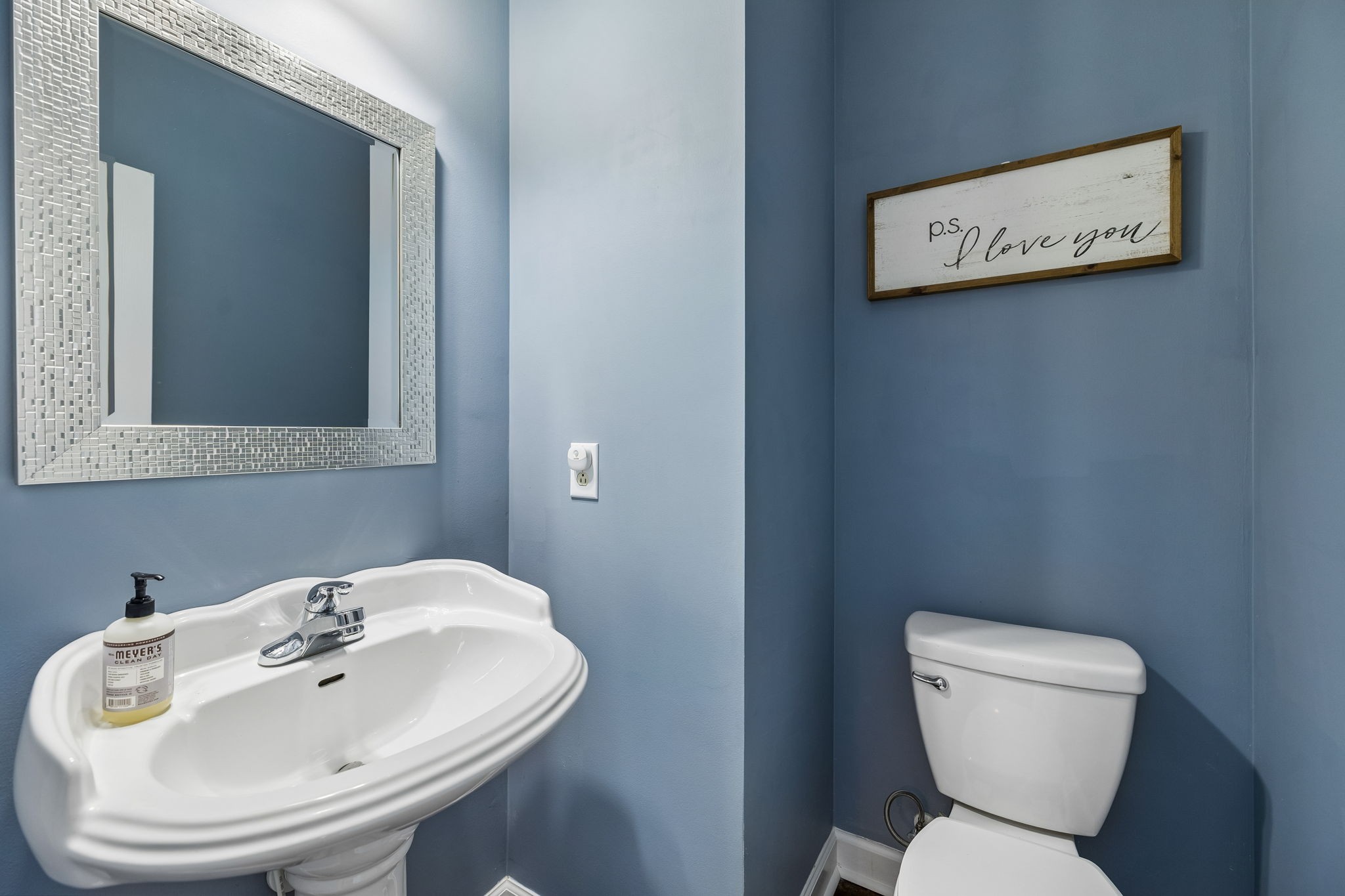 3918 Rowland Road Murfreesboro, TN 37128 - Photo 8 of 50 a bathroom with a toilet a sink and a mirror