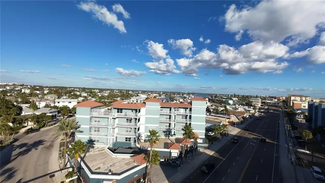 a view of a balcony with chairs